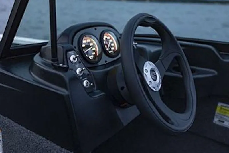 Slide: The Image of Steering console of 2027 Crestliner 1650 Kodiak WT boat with gauges and controls. - 69
