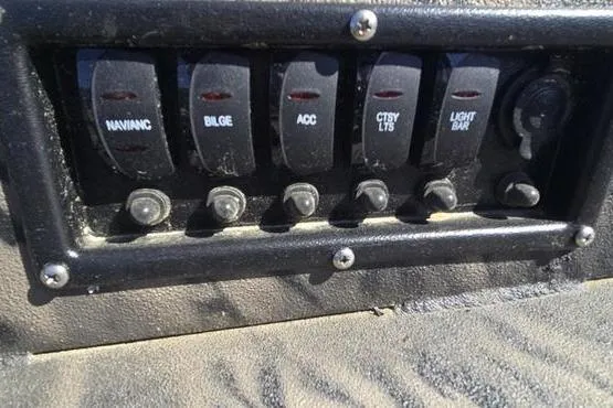 Slide: The Image of Control panel of a 2026 Havoc 1553 VJST with labeled switches for various functions. - 2