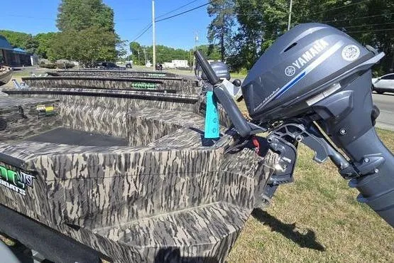 Slide: The Image of Camouflage-patterned 2026 Havoc 1553 VJST boat with Yamaha outboard motor on display. - 6