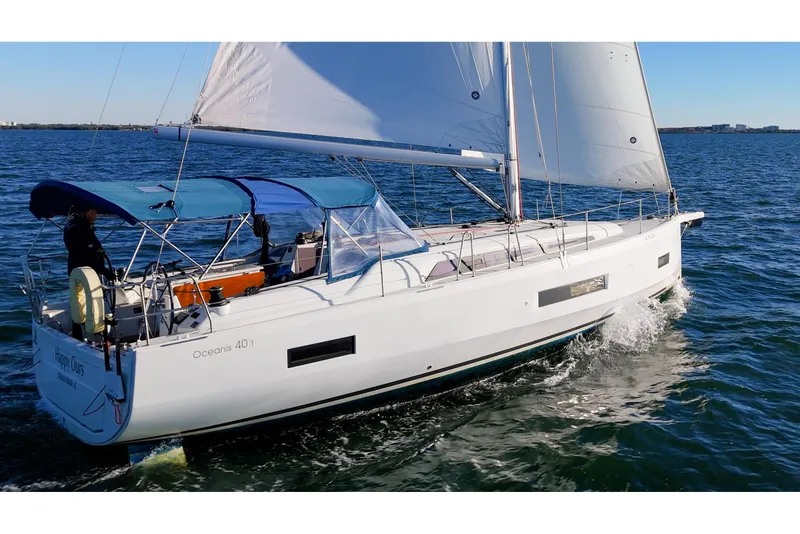 The Image of 2022 Beneteau Oceanis 40.1 sailing on open water under clear skies. - 0