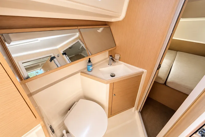 Slide: The Image of Interior of 2022 Beneteau Oceanis 40.1 yacht bathroom with sink and mirror. - 27