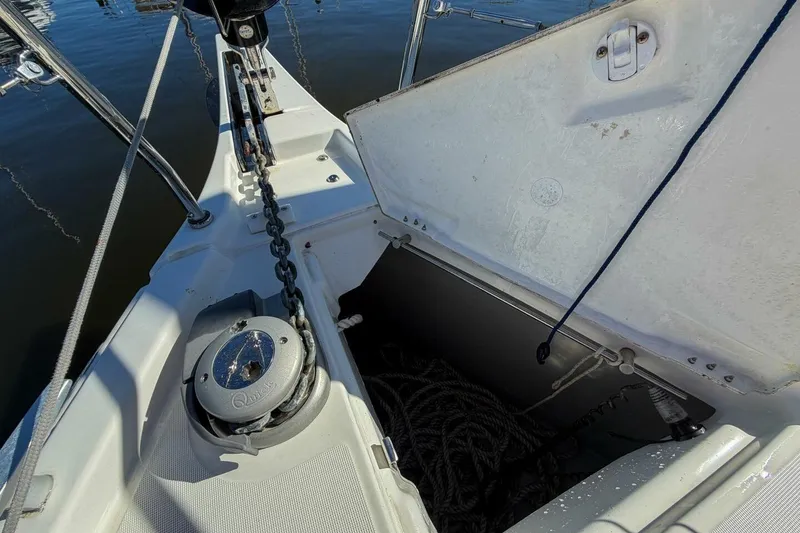 Slide: The Image of Anchor locker and windlass on 2022 Beneteau Oceanis 40.1 sailboat. - 100