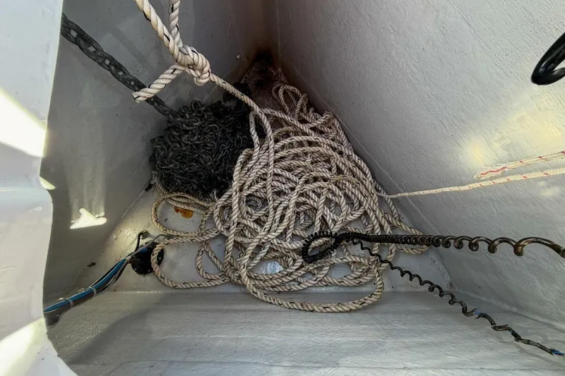 Slide: The Image of Rope and chain storage in 2022 Beneteau Oceanis 40.1 sailboat compartment. - 101