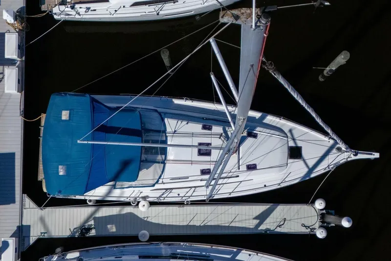 Slide: The Image of Overhead view of 2022 Beneteau Oceanis 40.1 sailboat docked at marina. - 118