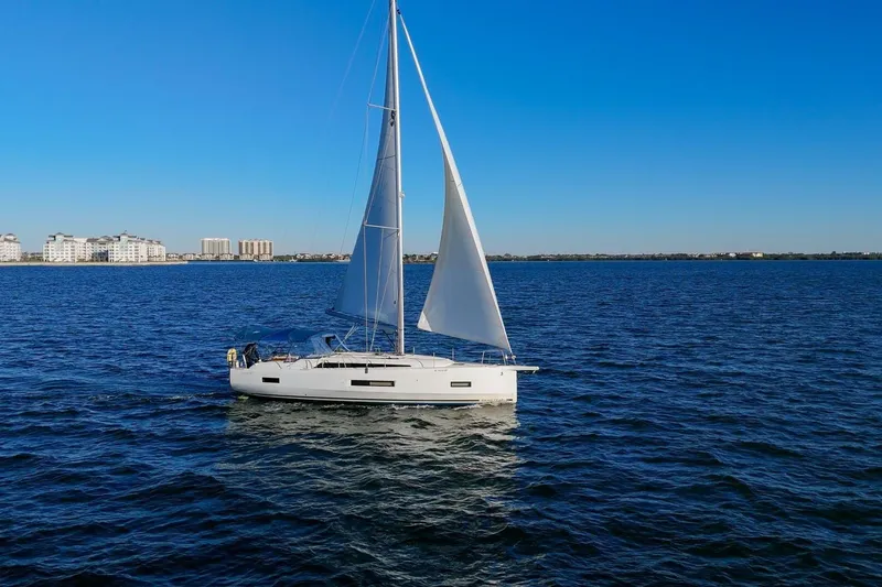 Slide: The Image of 2022 Beneteau Oceanis 40.1 sailing on a calm blue sea under clear skies. - 121