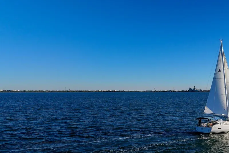 Slide: The Image of 2022 Beneteau Oceanis 40.1 sailing on a clear blue sea under a bright sky. - 136