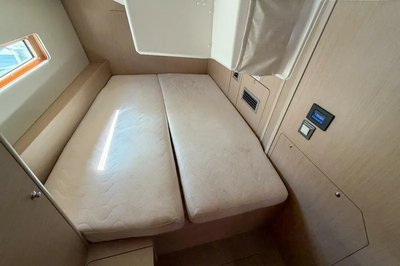 Slide: The Image of Interior cabin of 2022 Beneteau Oceanis 40.1 yacht with comfortable bedding. - 19