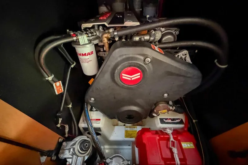 Slide: The Image of Engine compartment of a 2022 Beneteau Oceanis 40.1 sailboat, featuring Yanmar components. - 38