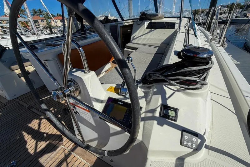 Slide: The Image of Cockpit of 2022 Beneteau Oceanis 40.1 sailboat with steering wheel and navigation instruments. - 66