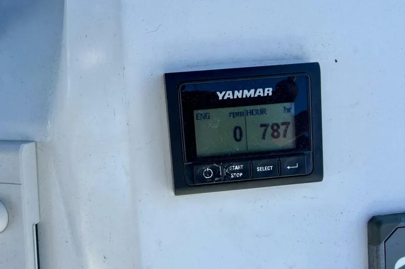 Slide: The Image of Yanmar engine display on 2022 Beneteau Oceanis 40.1 showing 787 hours. - 67