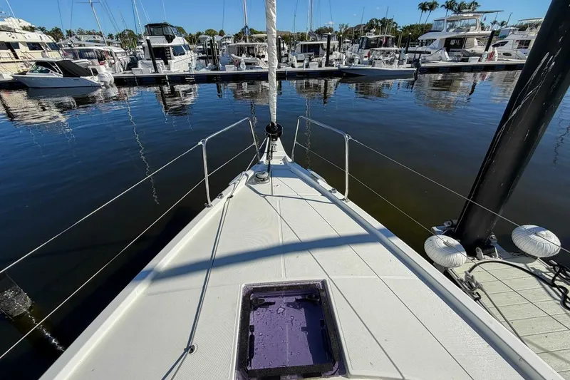 Slide: The Image of Beneteau Oceanis 40.1 sailboat docked at marina, 2022 model, sunny day. - 97