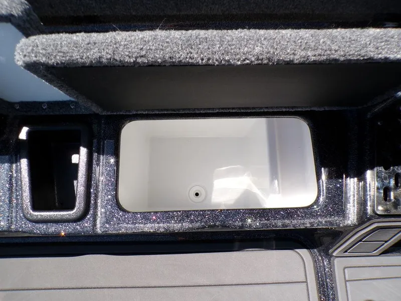 Slide: The Image of Interior compartment of 2025 Phoenix 920 Elite boat, featuring storage and utility space. - 21
