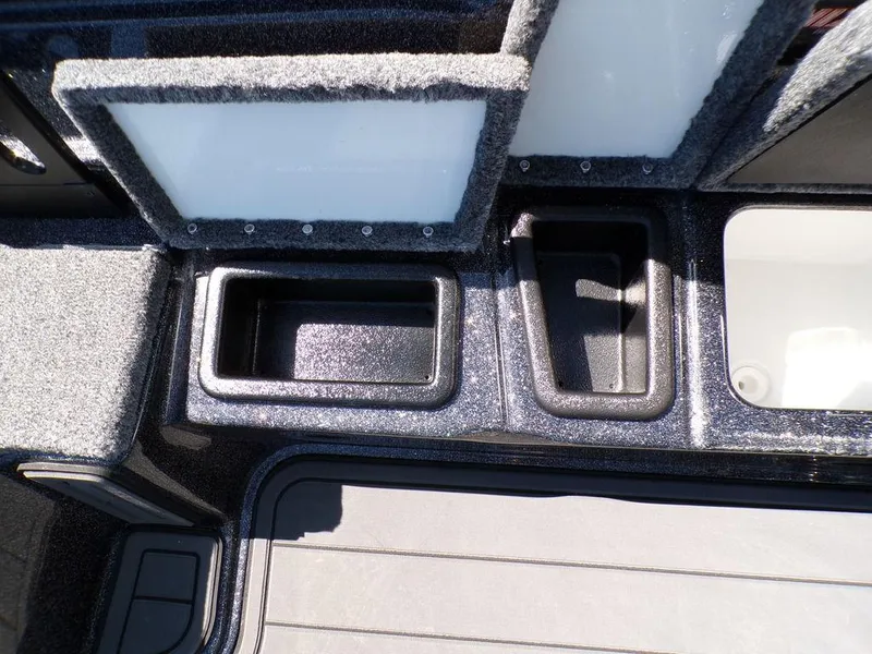 Slide: The Image of Interior compartments of a 2025 Phoenix 920 Elite boat, featuring storage and utility spaces. - 22