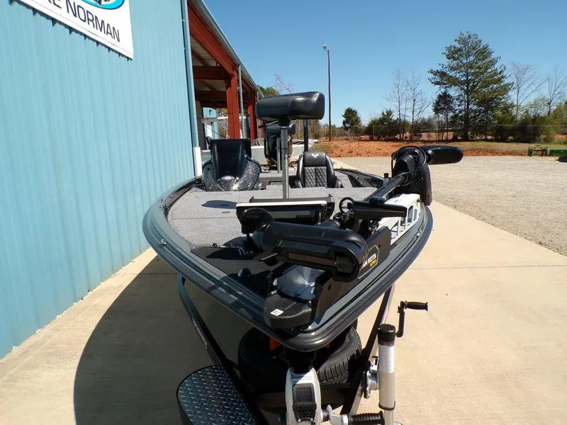 Slide: The Image of 2025 Phoenix 920 Elite boat parked outside, showcasing sleek design and advanced features. - 3