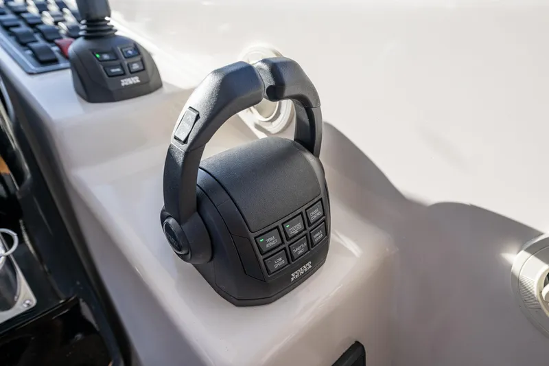 Slide: The Image of Throttle control panel on a 2006 Tiara Yachts 4000 Sovran boat. Updated steering, throttle controls, Joystick withe Integrated Propulsion Sysetm - 33