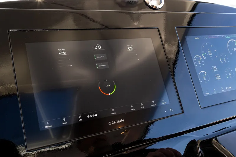 Slide: The Image of Garmin display on 2006 Tiara Yachts 4000 Sovran dashboard, showing navigation and system data. - 39
