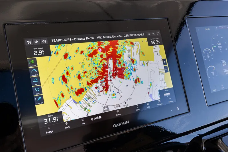Slide: The Image of Garmin navigation display on 2006 Tiara Yachts 4000 Sovran, showing radar and GPS data. - 41