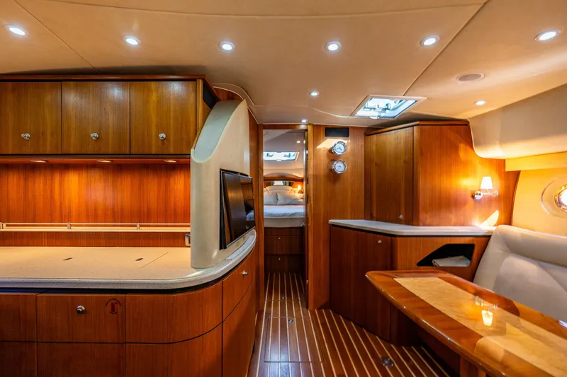 Slide: The Image of Luxurious interior of 2006 Tiara Yachts 4000 Sovran with elegant wood finishes. - 44