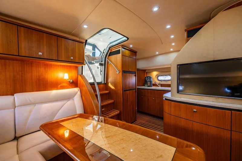 Slide: The Image of Luxurious interior of 2006 Tiara Yachts 4000 Sovran with elegant wood finishes and modern amenities. - 45