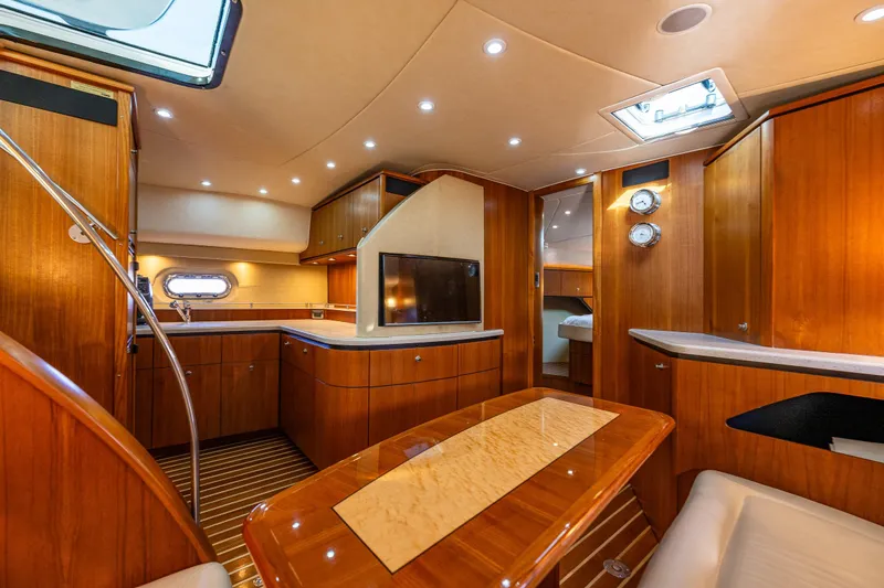 Slide: The Image of Luxurious interior of 2006 Tiara Yachts 4000 Sovran with elegant wood finishes and modern amenities. - 49