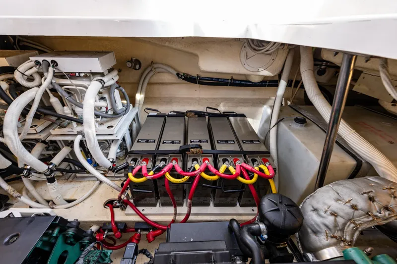 Slide: The Image of Engine room of 2006 Tiara Yachts 4000 Sovran with batteries and wiring. - 61