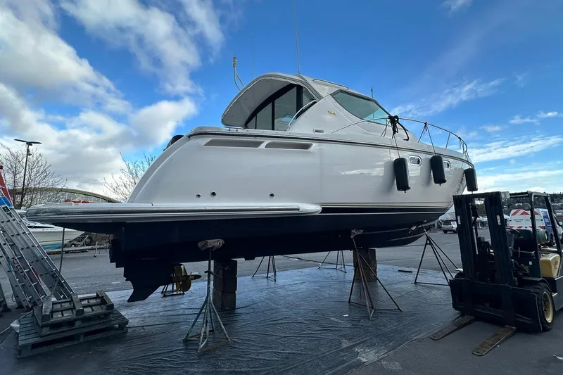 Slide: The Image of 2006 Tiara Yachts 4000 Sovran on dry dock, clear sky background. - 69