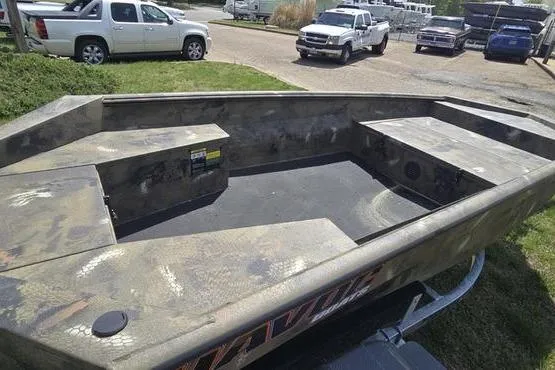 Slide: The Image of 2026 Havoc 1553 VJST boat with camouflage design, parked on a trailer. - 4
