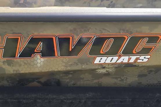 Slide: The Image of Havoc Boats logo on camouflage-patterned surface, model 1553 VJST, year 2026. - 8