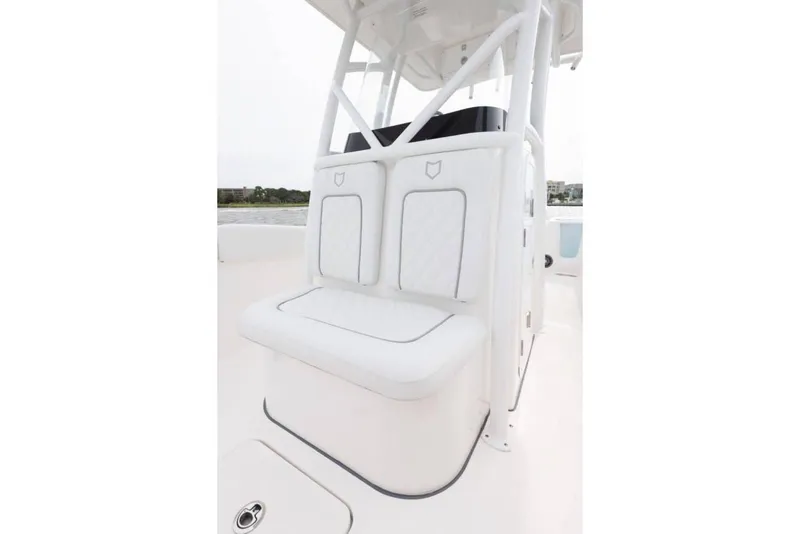 Slide: The Image of Manufacturer Provided Image: 2025 Sea Fox 248 Commander boat seating, white cushioned bench with backrest. - 13