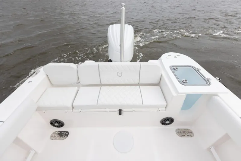 Slide: The Image of Manufacturer Provided Image: 2025 Sea Fox 248 Commander boat interior with white seating and ocean view. - 18