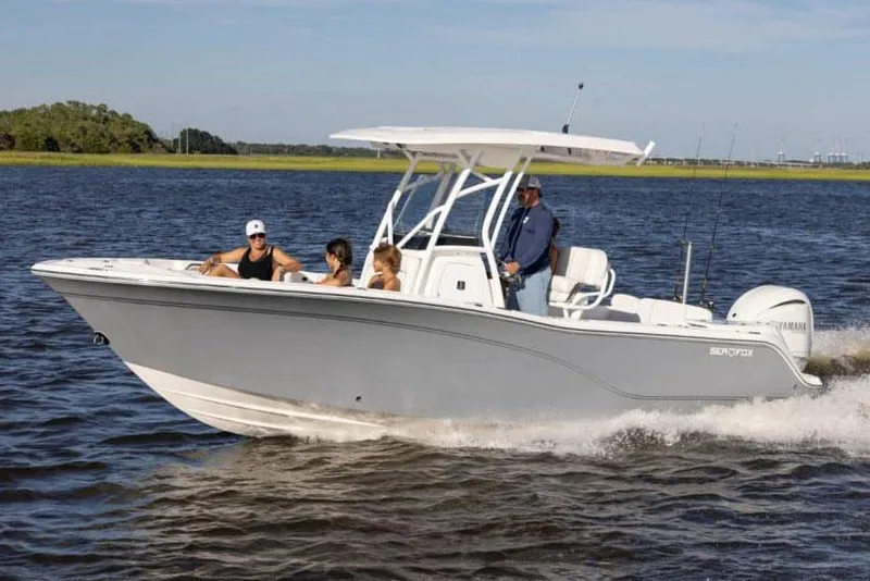 Slide: The Image of Manufacturer Provided Image: 2025 Sea Fox 248 Commander boat cruising with passengers on a sunny day. - 7
