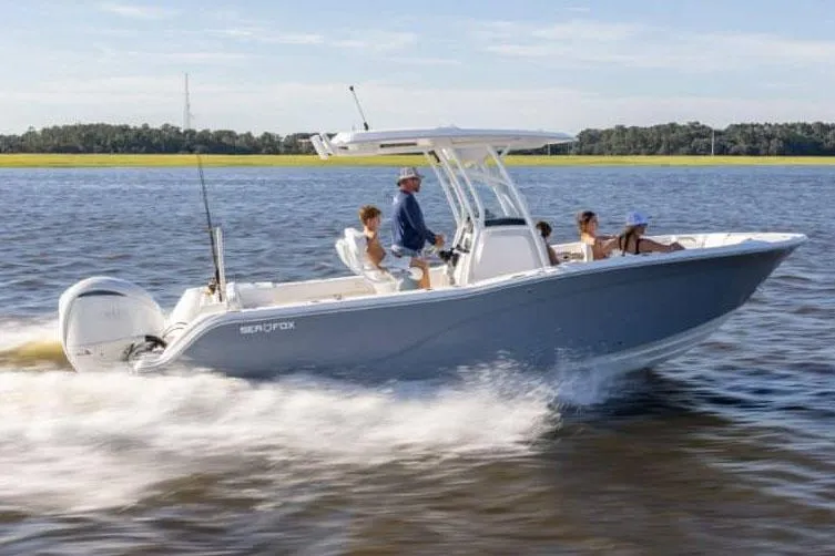 Slide: The Image of Manufacturer Provided Image: 2025 Sea Fox 248 Commander boat cruising on a sunny day with passengers onboard. - 8
