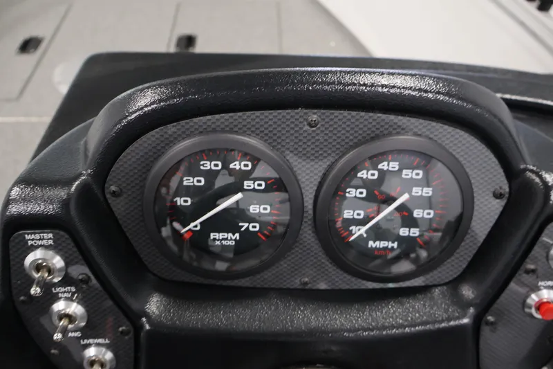Slide: The Image of Dashboard of 2026 Crestliner 1650 Kodiak SC boat with RPM and MPH gauges. - 26