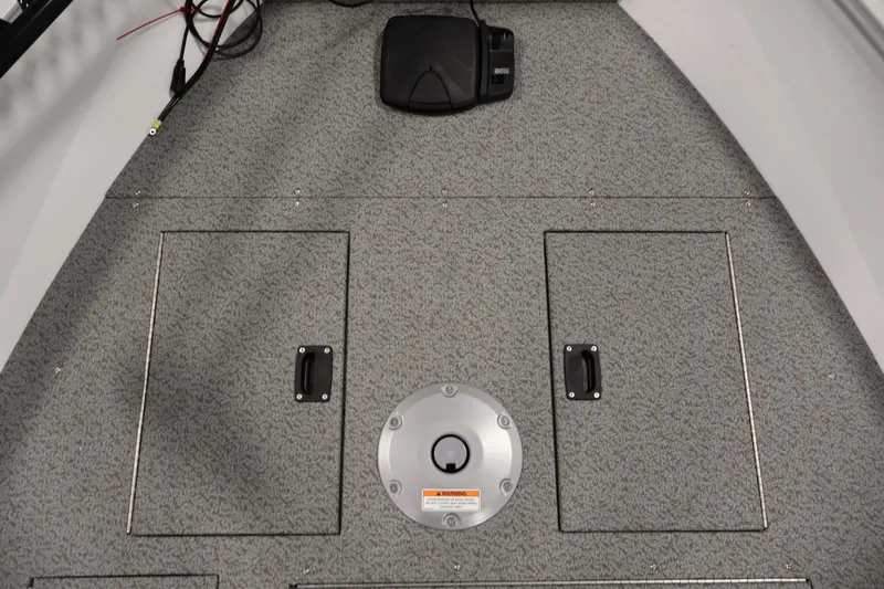Slide: The Image of 2026 Crestliner 1650 Kodiak SC boat deck with storage compartments and wiring. - 20