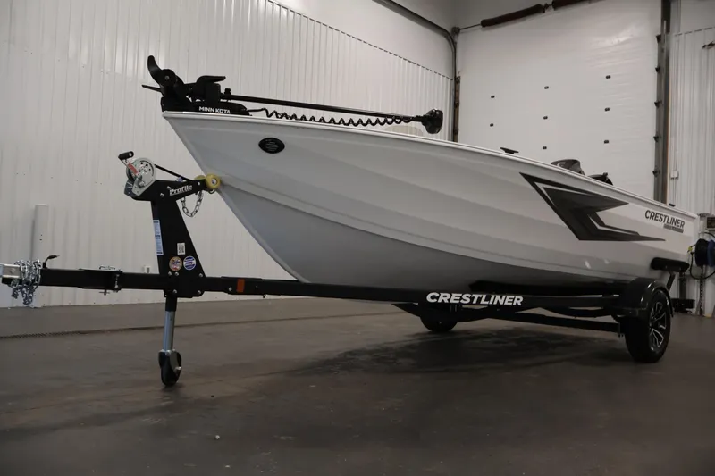 Slide: The Image of 2026 Crestliner 1650 Kodiak SC boat on trailer in indoor setting. - 44