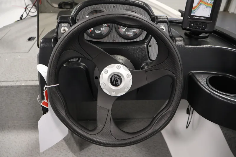 Slide: The Image of Steering wheel and dashboard of 2026 Crestliner 1650 Kodiak SC boat. - 25