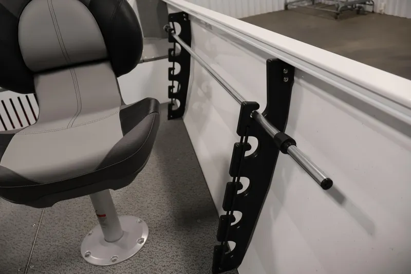 Slide: The Image of 2026 Crestliner 1650 Kodiak SC boat interior with seat and rod holder. - 33