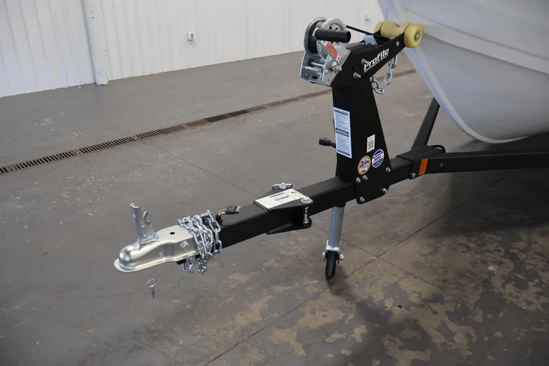 Slide: The Image of Trailer hitch of 2026 Crestliner 1650 Kodiak SC boat in a garage setting. - 43
