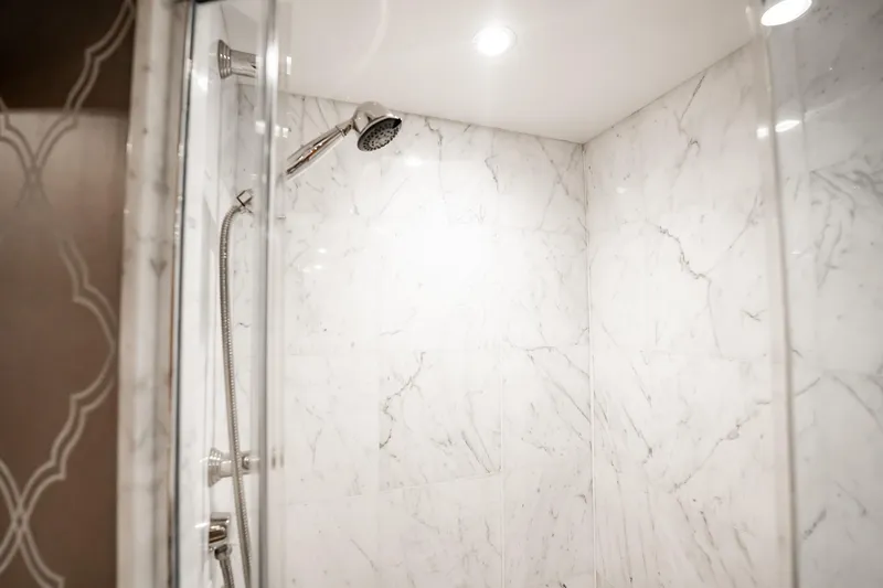 Slide: The Image of Luxurious marble shower interior on 2012 Hatteras 80 Motor Yacht. - 154