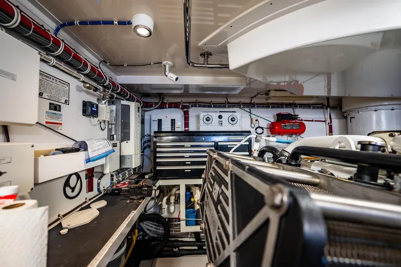 Slide: The Image of Engine room of 2012 Hatteras 80 Motor Yacht with tools and equipment. - 167
