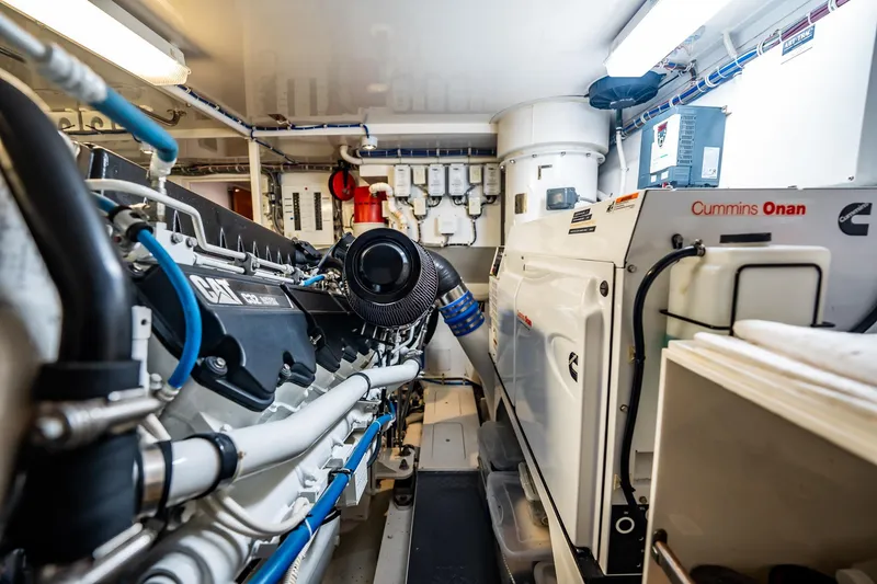 Slide: The Image of Engine room of a 2012 Hatteras 80 Motor Yacht with CAT and Cummins Onan systems. - 170