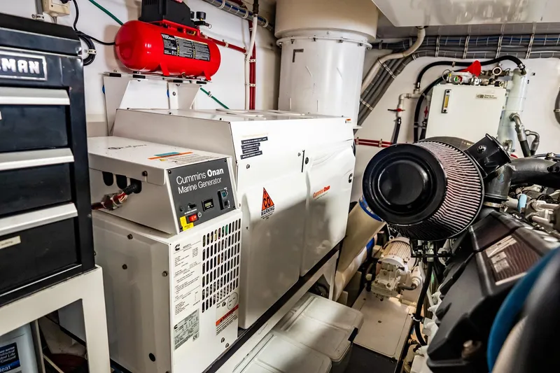 Slide: The Image of Engine room of 2012 Hatteras 80 Motor Yacht with Cummins Onan marine generator. - 172