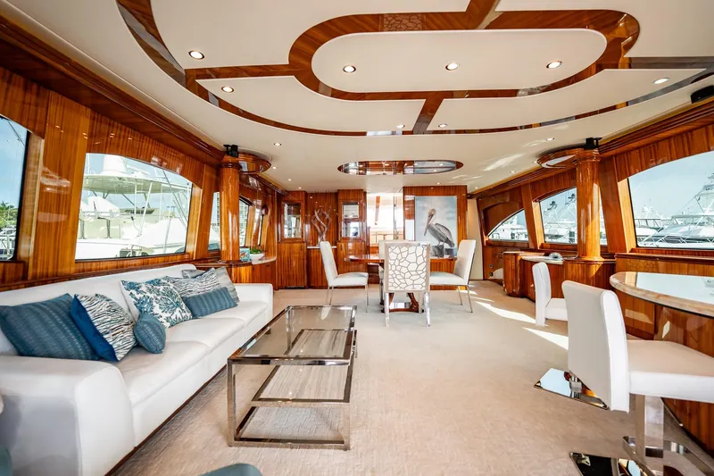 Slide: The Image of Luxurious interior of 2012 Hatteras 80 Motor Yacht with elegant wood finishes and modern furnishings. - 58