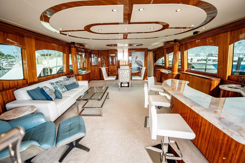 Slide: The Image of Luxurious interior of 2012 Hatteras 80 Motor Yacht with elegant wood finishes and modern furnishings. - 67