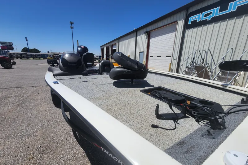 Slide: The Image of 2023 Tracker Pro Team 195 TXW Tournament Edition boat at dealership, showcasing deck and seating. - 3