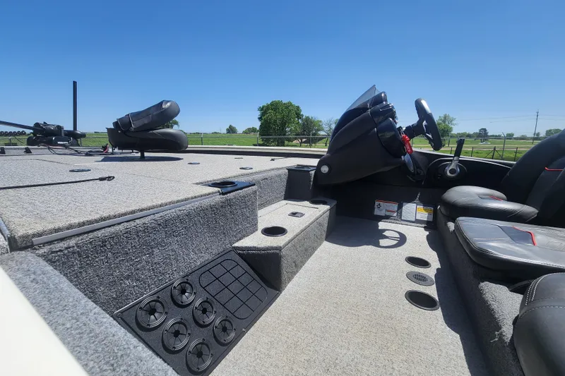 Slide: The Image of 2023 Tracker Pro Team 195 TXW Tournament Edition boat interior with steering console. - 5