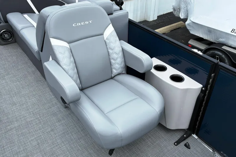 Slide: The Image of Luxury seating on 2025 Crest CLASSIC 220 SLC boat with cup holders. - 9