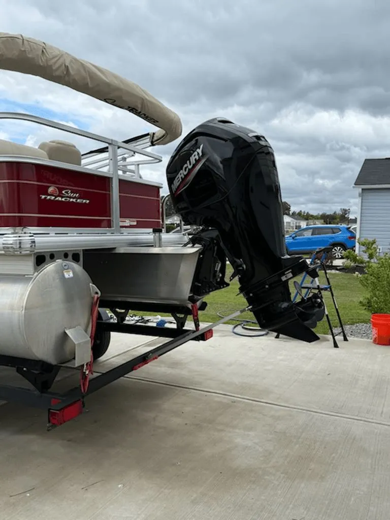 Slide: The Image of 2024 Sun Tracker PARTY BARGE with Mercury engine on trailer. - 10