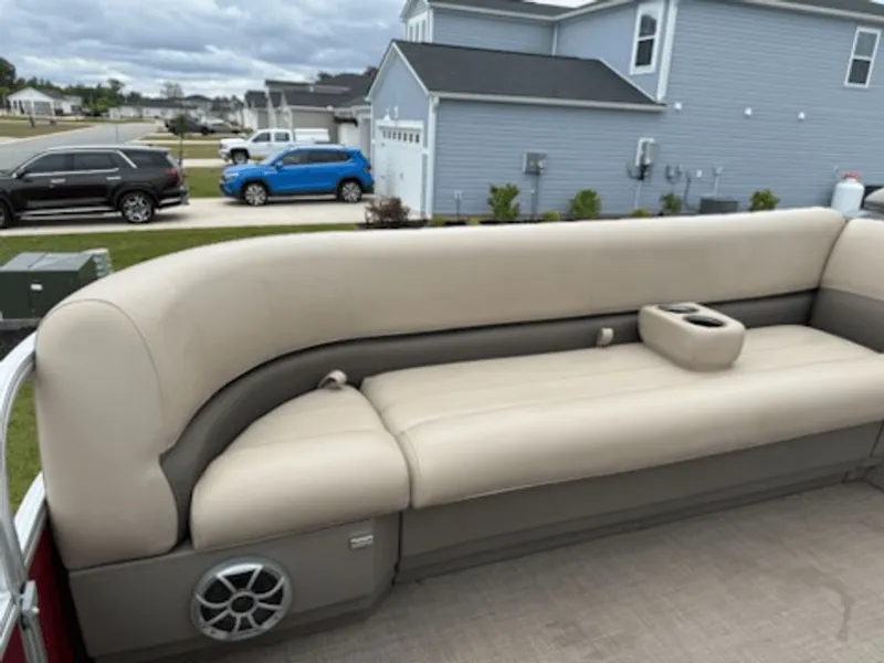 Slide: The Image of 2024 Sun Tracker PARTY BARGE seating area with speaker. - 5