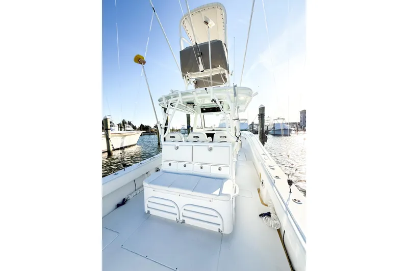 Slide: The Image of 2022 Onslow Bay 41 Tournament boat interior with seating and fishing equipment. - 12